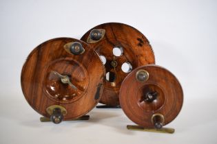Three centre pin fly reels, wood and brass. See photos.