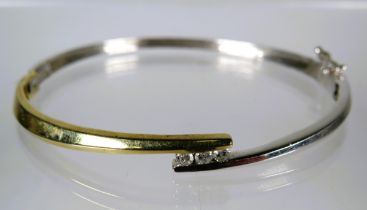 9ct Yellow & White Gold Bangle Bracelet set with a Trio of 2.5 mm Diamonds (0.15pts) Total Weight