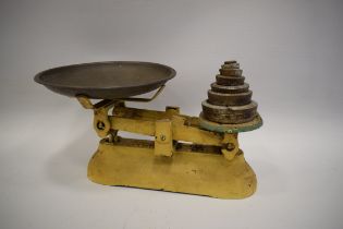 Set of Vintage scales with seven weights. See photos.  S2