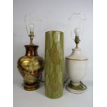 Two modern table lamps with shades and a floor vase.