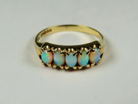 9ct Yellow Gold ring set with Five Opals. Finger size 'P-5' 2.4g