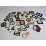 Good selection of Bakelite, plastic, wooden and metal beslt buckles.