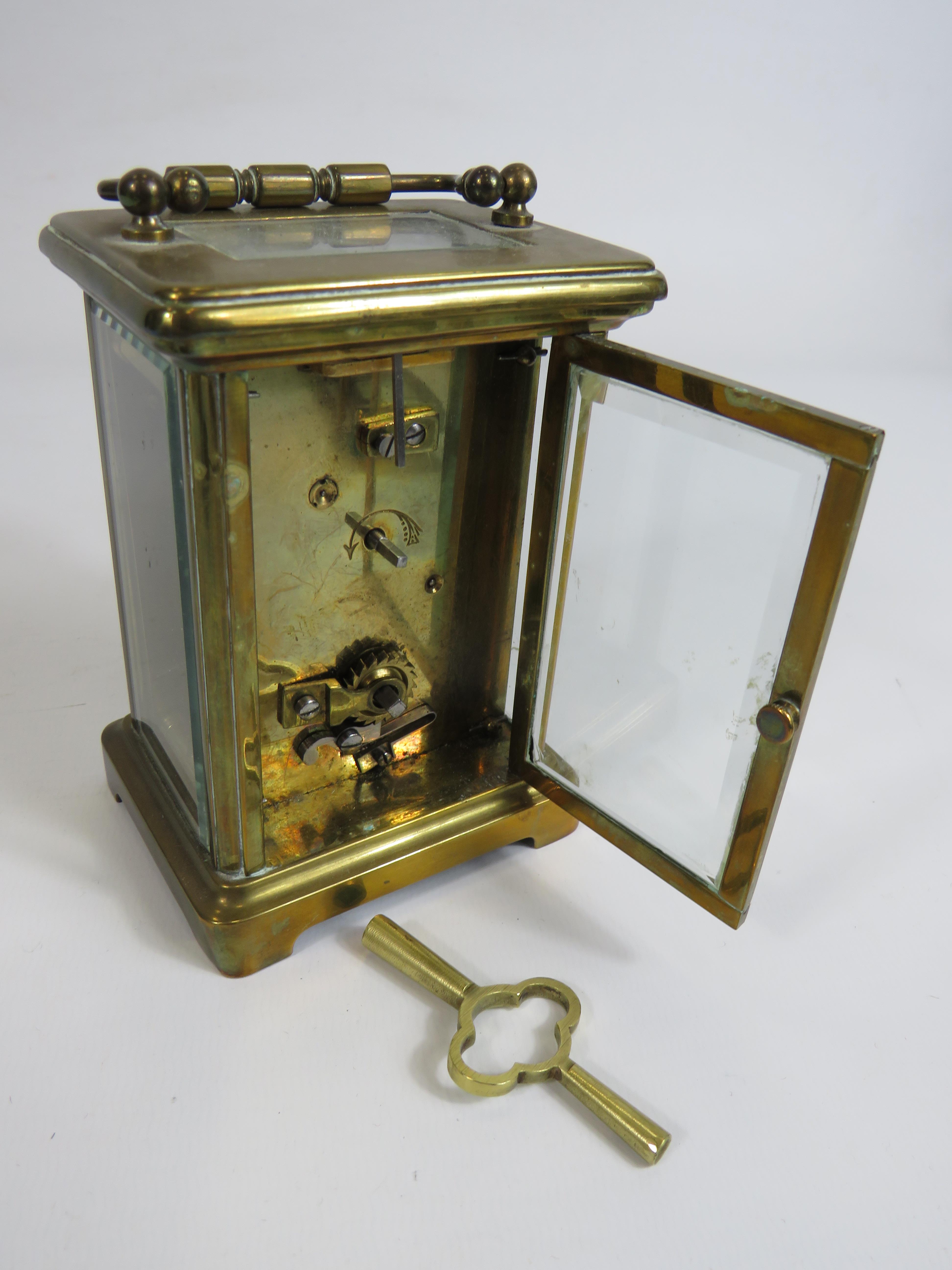 Pretty Brass Cased Carriage Clock with Key, enamel face. Running order 4.5 inches tall. ( door opens - Image 6 of 7