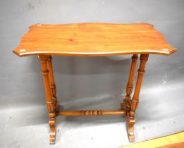 Occasional Table in good order.   Supported by four turned reeded legs.    H:28  inches tall.  See p