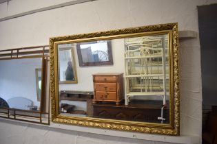 Bevelled edge modern mirror with fancy frame which measures approx 28 x 40 inches. See photos. S2