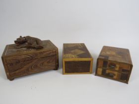 Vintage black forrest style trinket box with moving bear lock plus two vintage marquetry boxes.