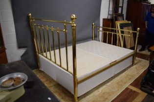 Double bed with Brass style bed base and headboard. See photos. S2