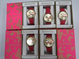 Five ladies or Girls quartz watches with butterfly motif to the dial. Leather straps. All boxed and