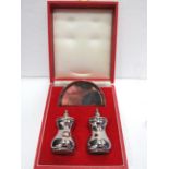 Silver Boxed presentation set of a pair of cruets and a small silver Salver.  Total Silver weight 10