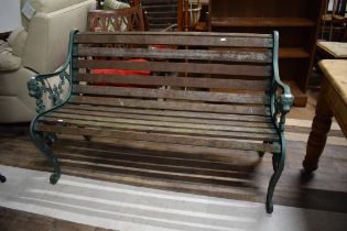 Cast Iron ended bench with lion mask detail. Good wood slats. HEAVY ITEM UNSUITABLE FOR POSTAGE. COL
