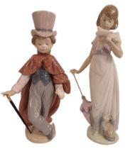 2 Lladro figurines, model no 6123 & 7611 with boxes. The tallest is 23cm. (boy has repair to one