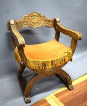 Oak X framed chair with lots of carved decoration. Armorial crest to splat..See photos. S2