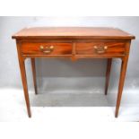 Mahogany Side table with two drawers .  Raised on tapered legs it measures approx 29 inches tall.   