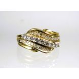 9ct Yellow Gold Diamond set Wave ring.  Finger size 'L'   3.0g with approx 0.30 pts of Diamonds.   