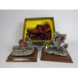 Two Marc locker pewter mythical figurines and a cherry resin galloping horses figurine.