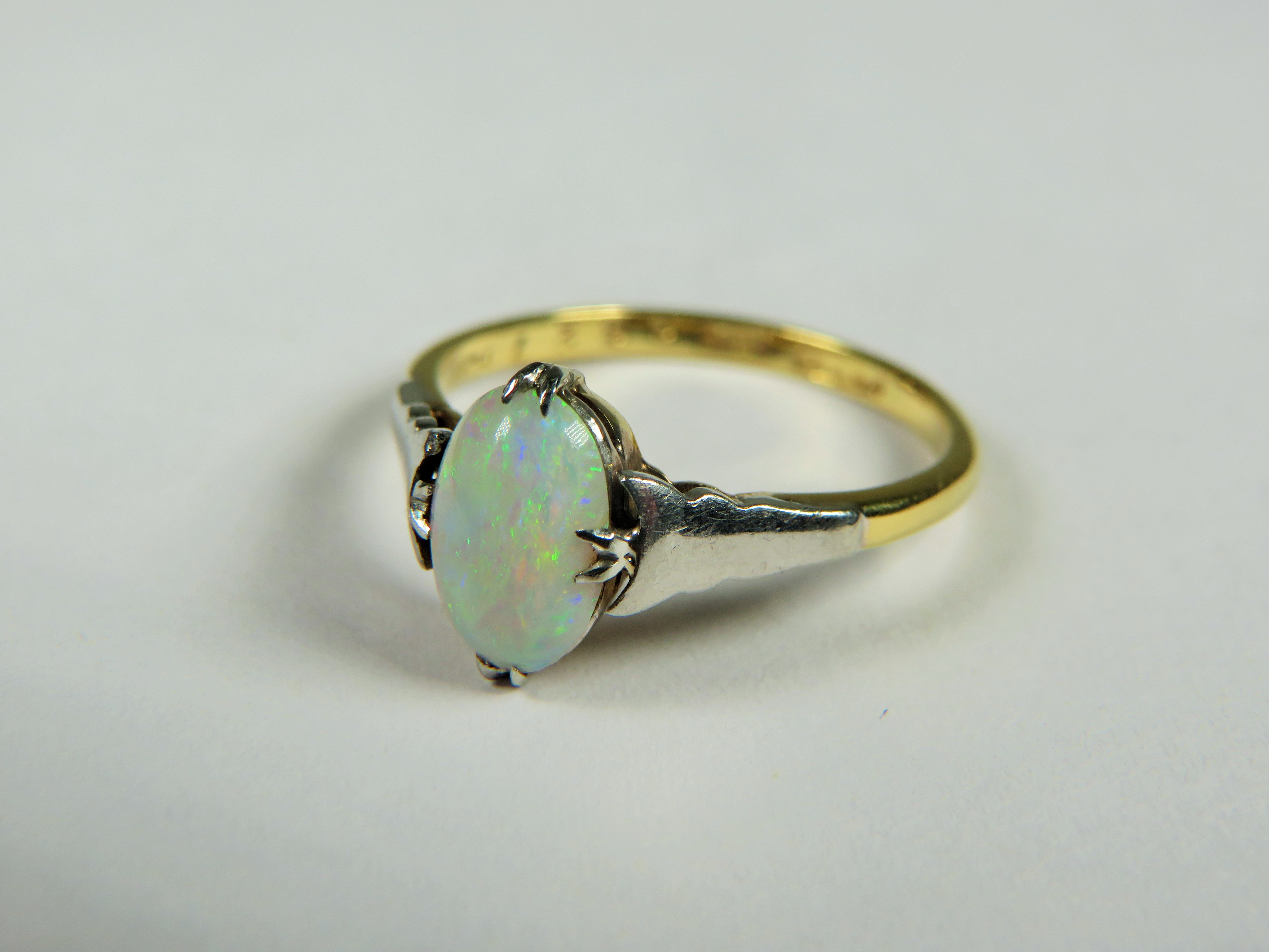 18ct Yellow Gold ring set with a lovely Oval Opal supported by Platinum shoulders.  Finger size 'P'  - Image 3 of 3