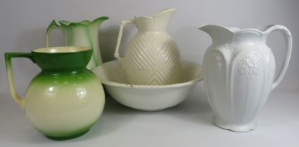 4 vintage wash jugs and a wash bowl, one jug does have chips to the base.