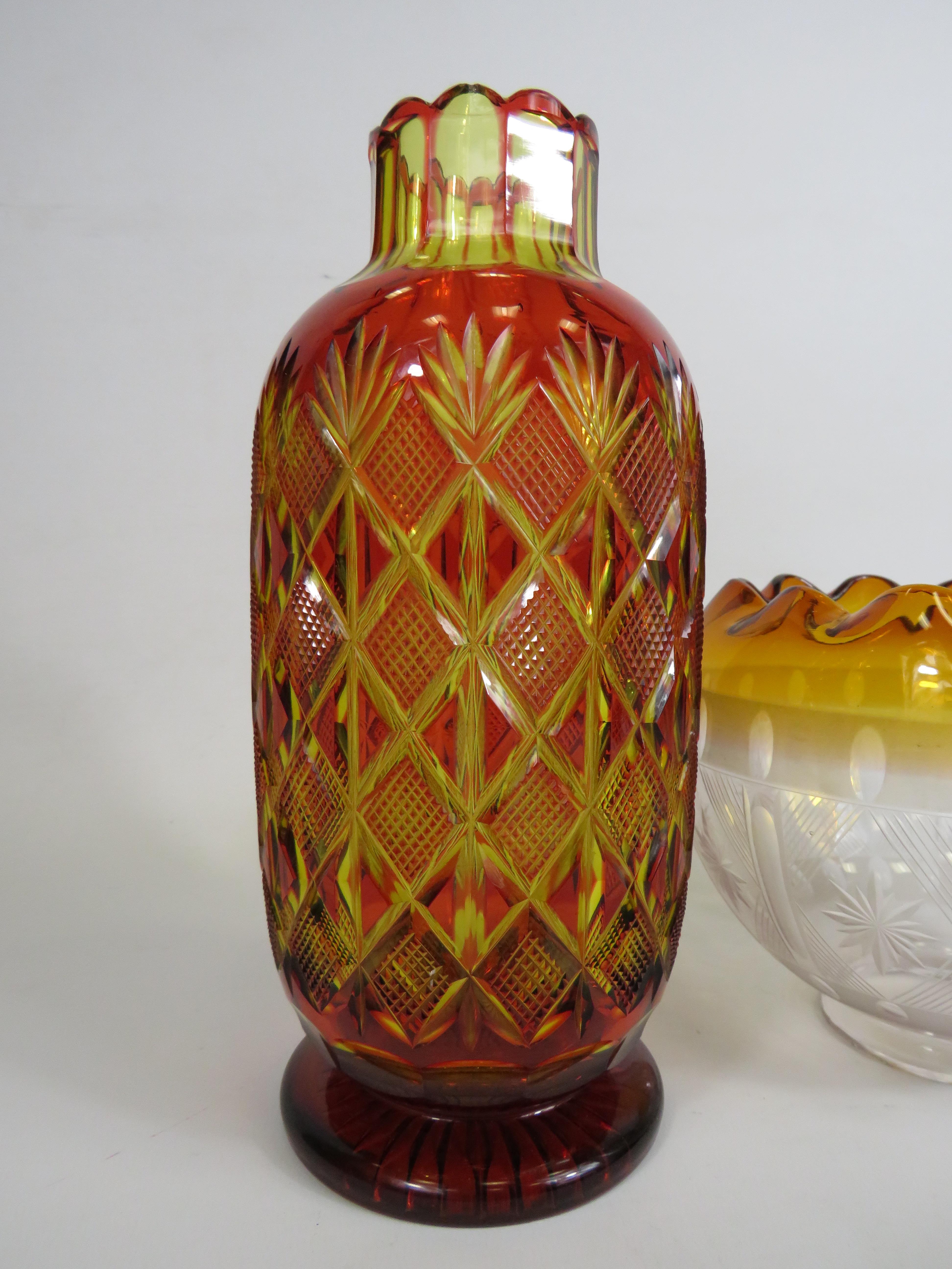 Ruby cut to amber Bohemian uranium glass vase, slight chips to the rim. The vase stands 24cm tall. - Image 3 of 4