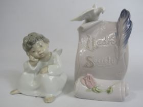 Lladro Angel and a point of sale scroll.