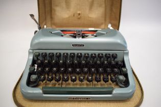 Imperial Good Companion 4 Travel typewriter with hard carry case.   See photos. S2