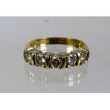 9ct Yellow Gold Half Eternity ring set with Five Diamonds which amount to approx 0.50pts.   Finger s