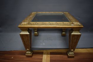 Coffee table with gilt faux marble decoration. Glass centre. Approx 20 inches tall. See photos.