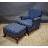 Long low chair with footstool in blue upholstery.  Carved decoration. See photos.  S2