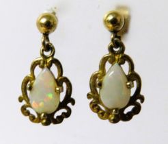 Pair of pretty Opal Set earrings in 9ct Yellow Gold Mounts approx 20mm long. See photos. 