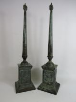 Pair of metal alloy art deco style cremation urns with eternal flame and verdigris effect standing