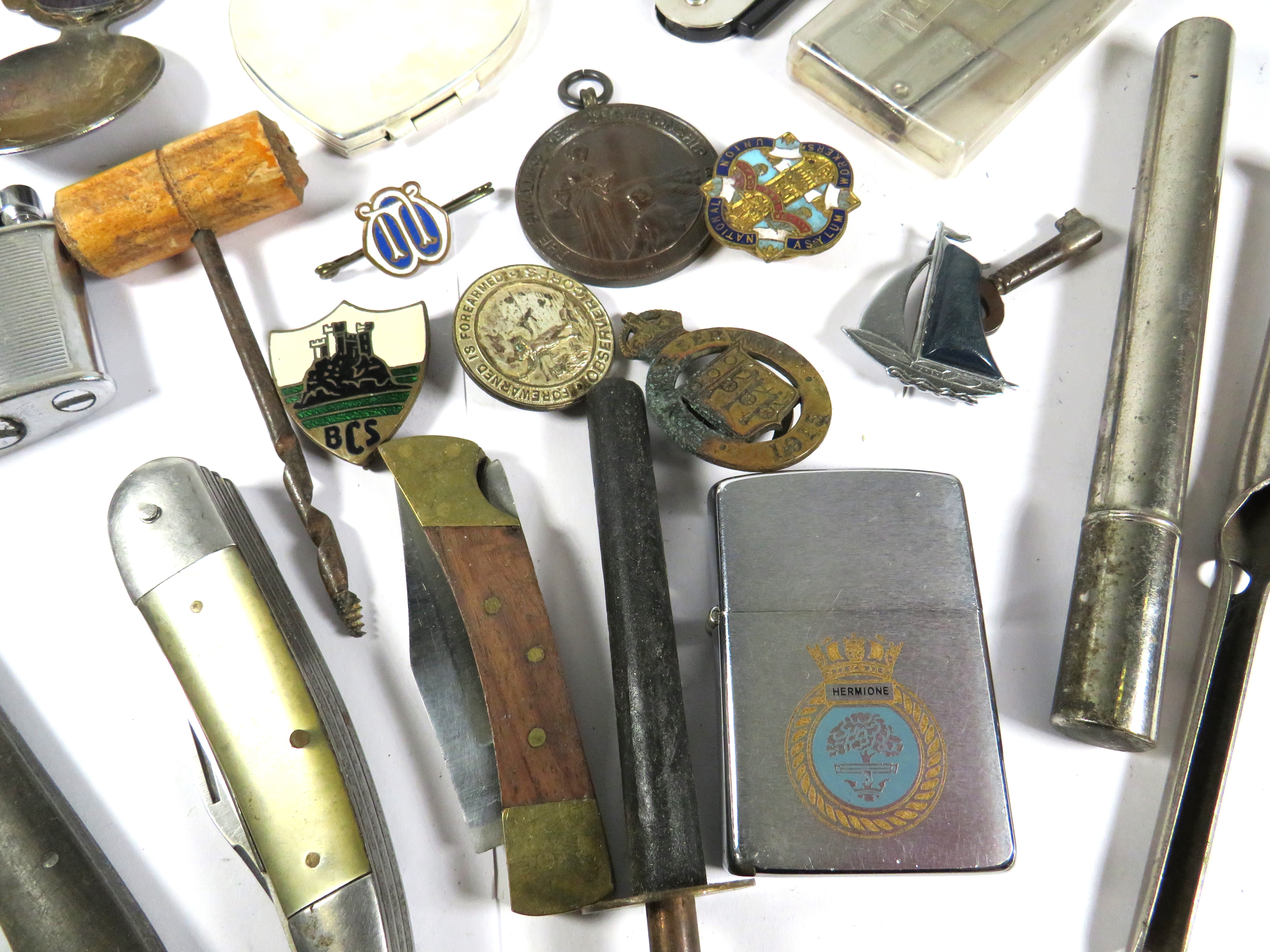 Mixed lot of treasures to include penknives, 1951 Winterton Show medal, Zippo Lighter HMS Hermione.  - Image 2 of 2