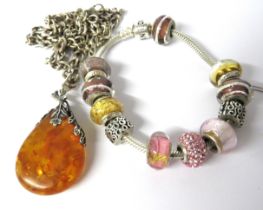 925 Silver set faux Amber pendant set on a long 24 inch silver gypsy link chain together with a Pand