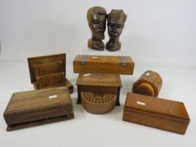 2 Carved wooden african busts and a selection of wooden keepsake and cigarette boxes.