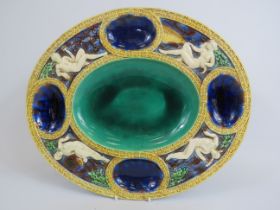 Minton majolica oyster plater c1870 decorated with the figures of Juno, Neptune, Mercury and Selene.