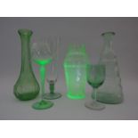 Selection of Uranium glass to include bottles, vase and glasses.