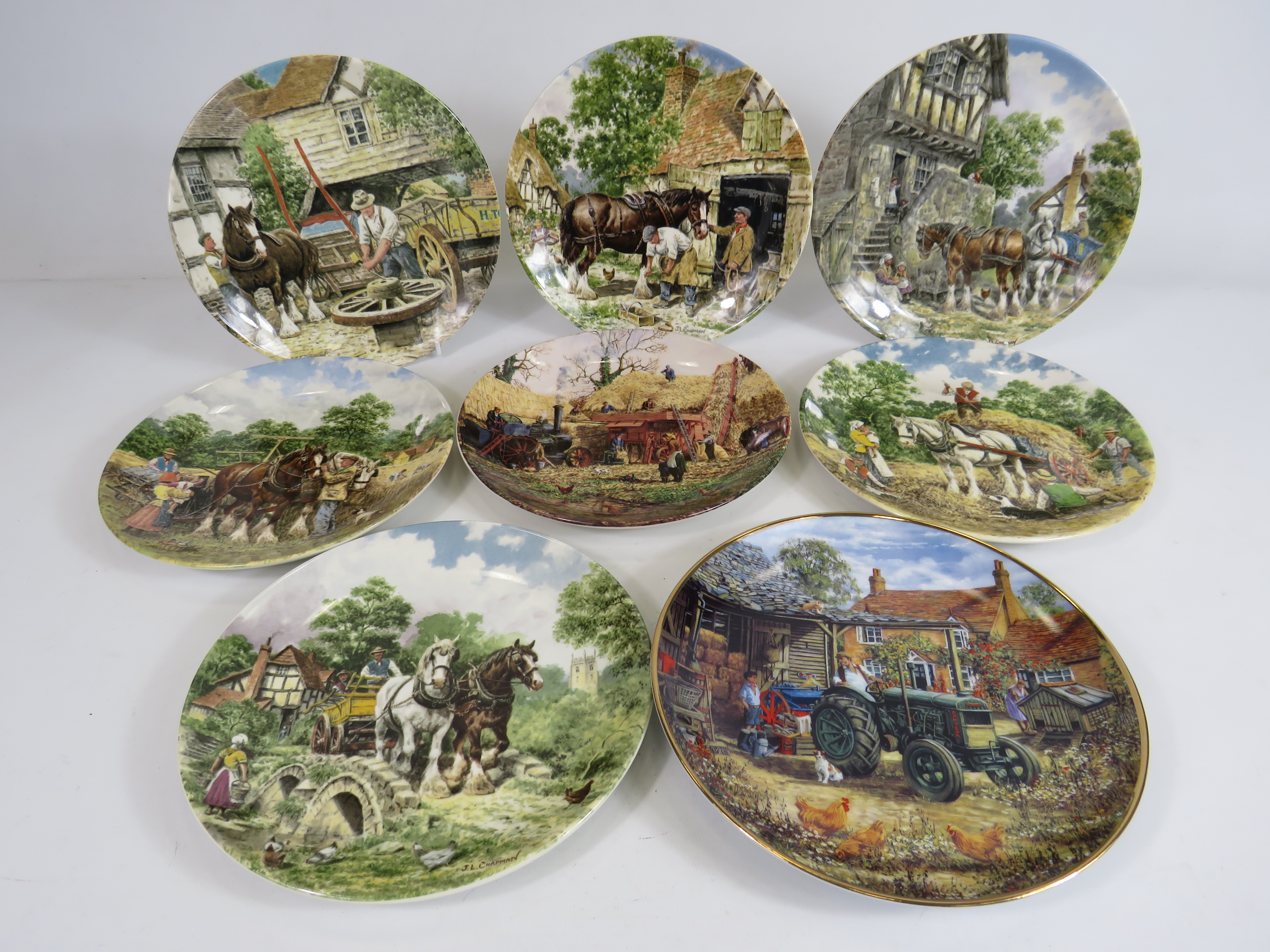 7 Wedgwood working horses plates and one Danbury Mint plate.