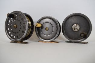 Three Vintage Fly Reels with aluminium bodies to include Alcock and Cow & Sons. See photos. For deta