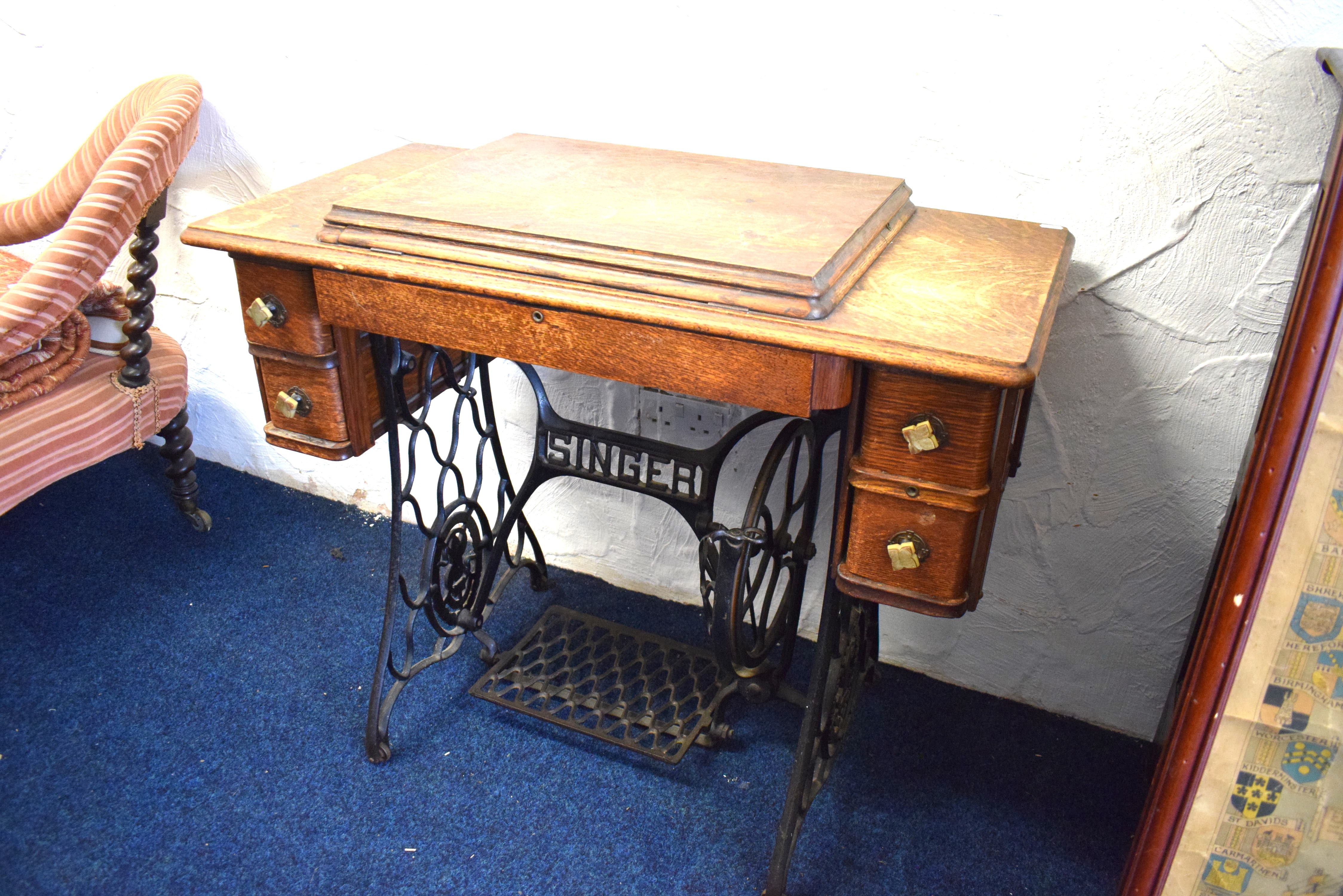 Singer sewing machine treadle table with four drawer cabinet.  See photos.  - Image 2 of 3