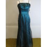 As New and unused Prom Dress or Ball Gown by Crystal Breeze in Turquoise and Black. Back  zip. UK si