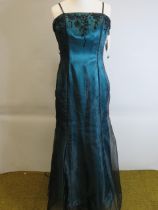 As New and unused Prom Dress or Ball Gown by Crystal Breeze in Turquoise and Black. Back zip. UK si