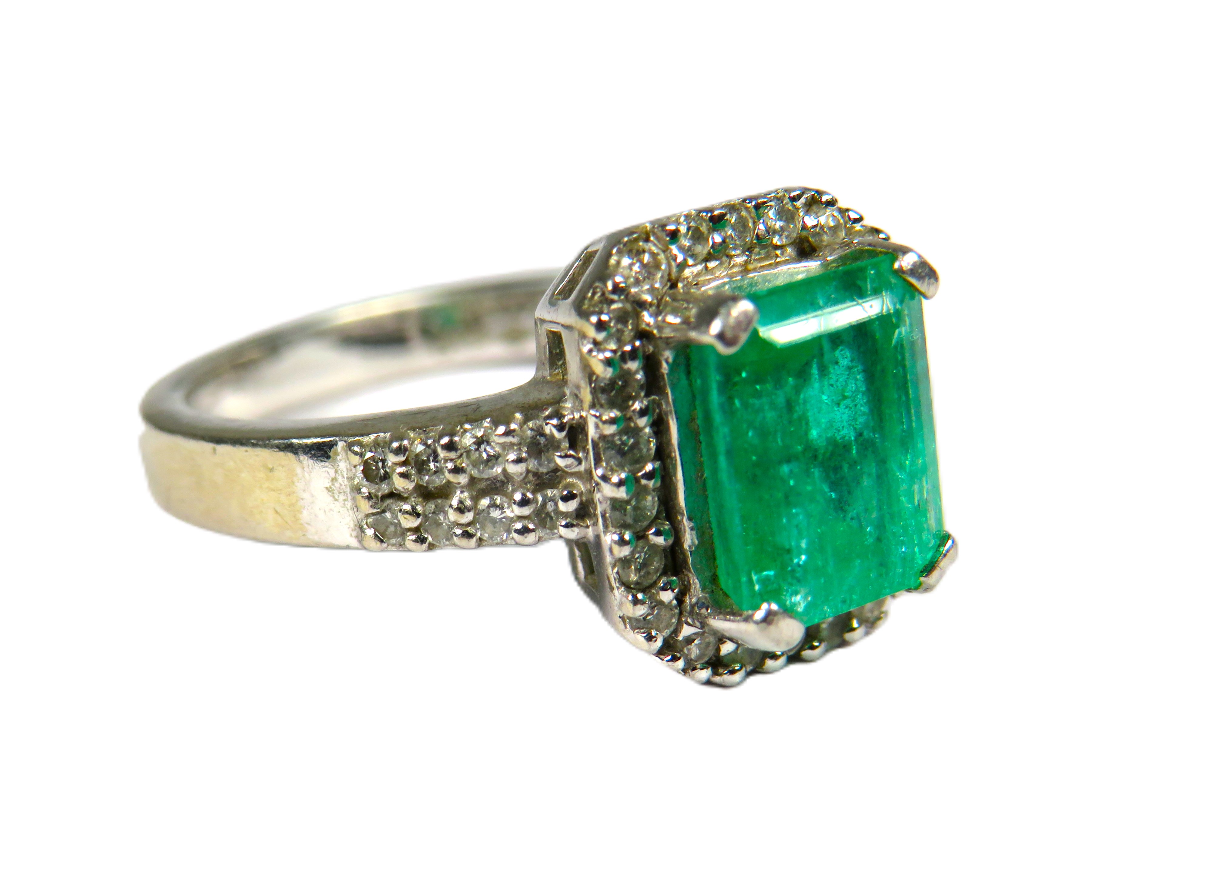 900 Platinum Ring set with a large Central Emerald of approx 2.16 cts and surrounded by Multiple Dia - Image 2 of 2