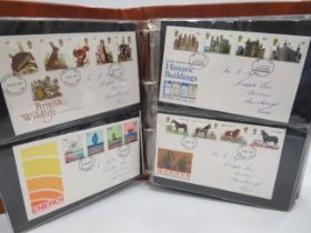 Large and well presented leatherette album of UK First Day Covers. (74) See photos