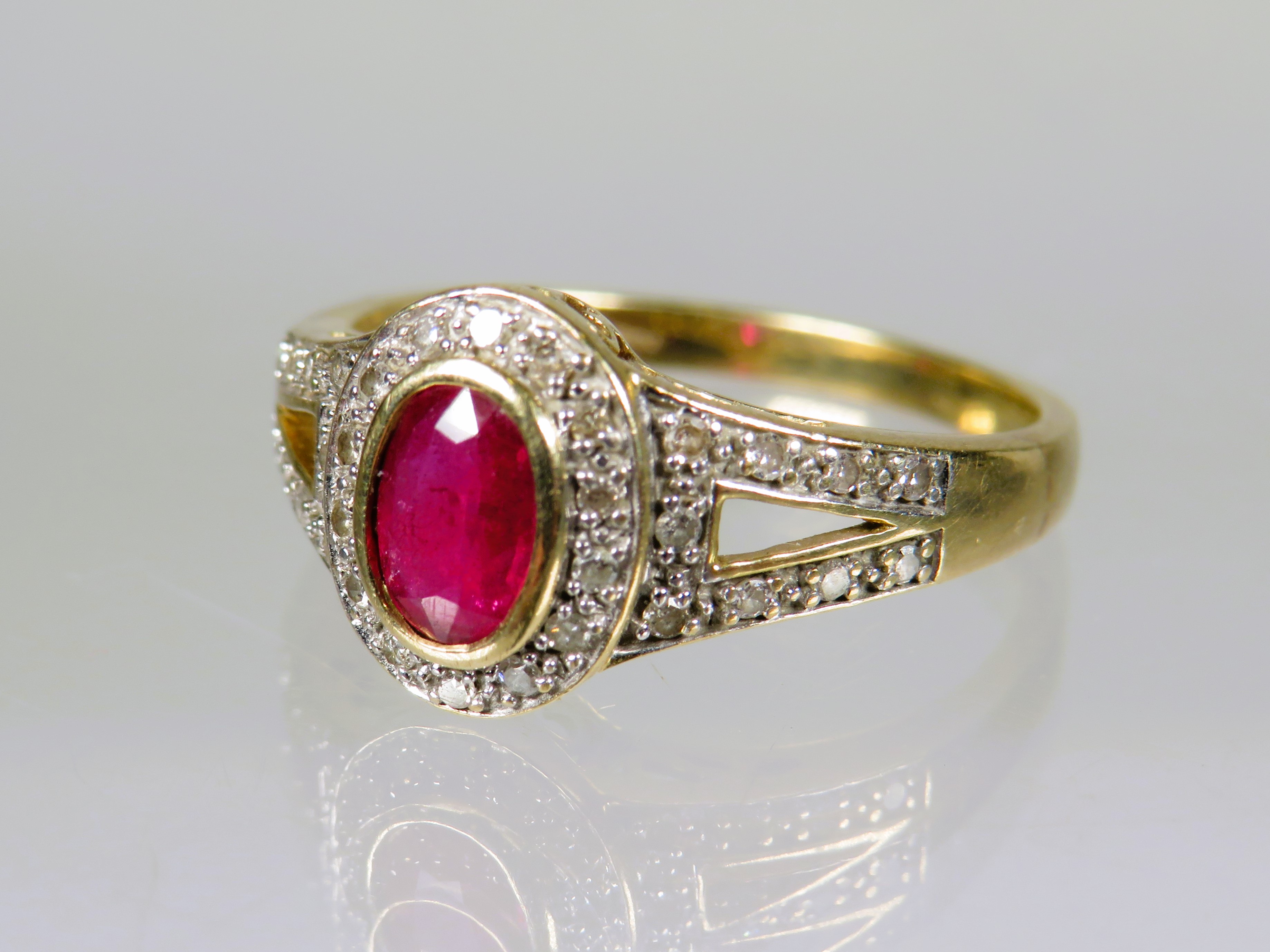 9ct Yellow Gold Ring set with a Central Oval Ruby with Diamonds to Shoulders.  Finger size 'P'    2. - Image 3 of 3