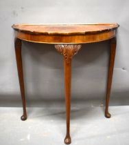 Attractive Demilune hallway or console table raised on three carved topped elegant legs it measures