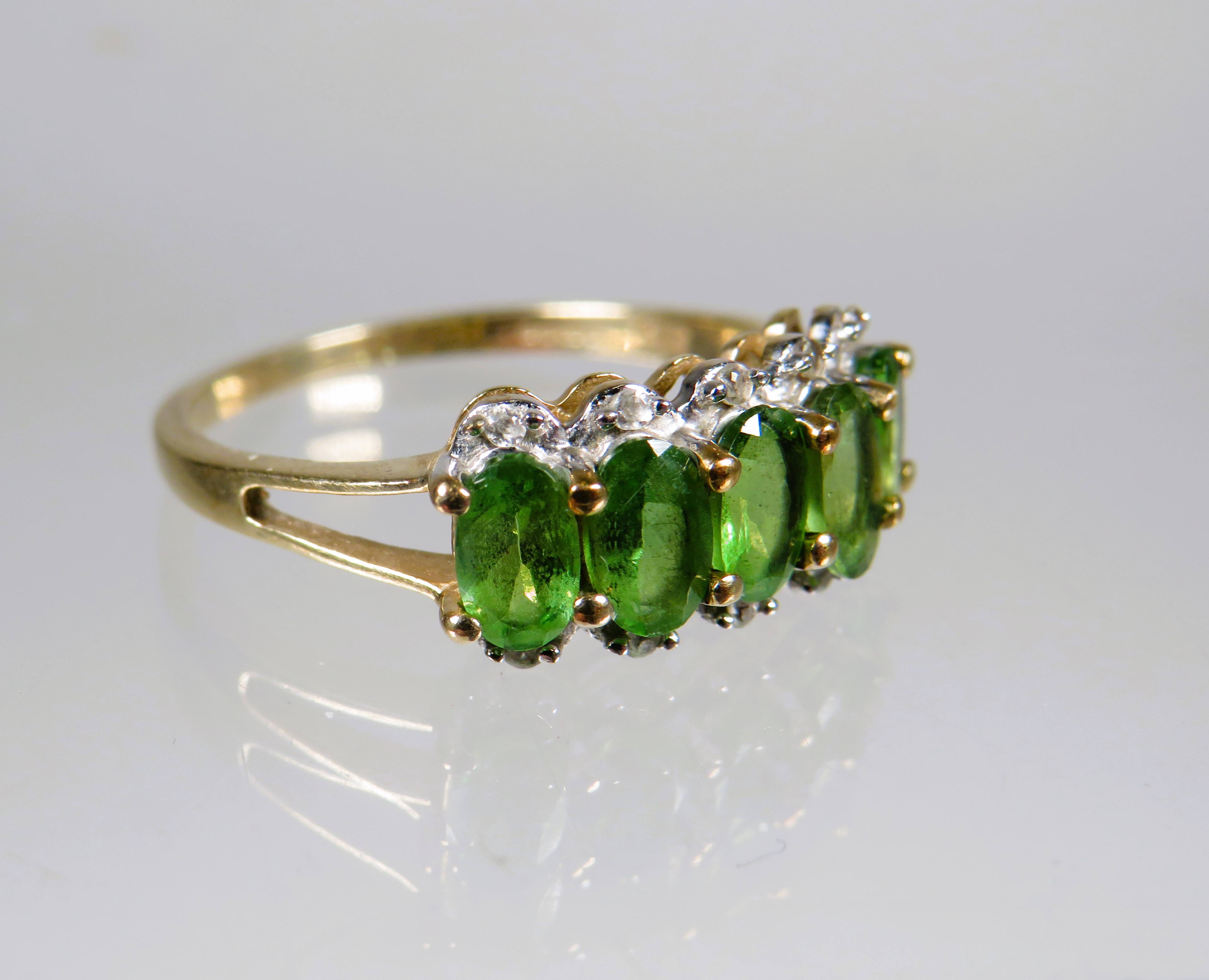9ct Yellow Gold Ring set with a cluster of Green and Clear CZ gemstones.. Finger size 'M-5'   1.8g - Image 2 of 3