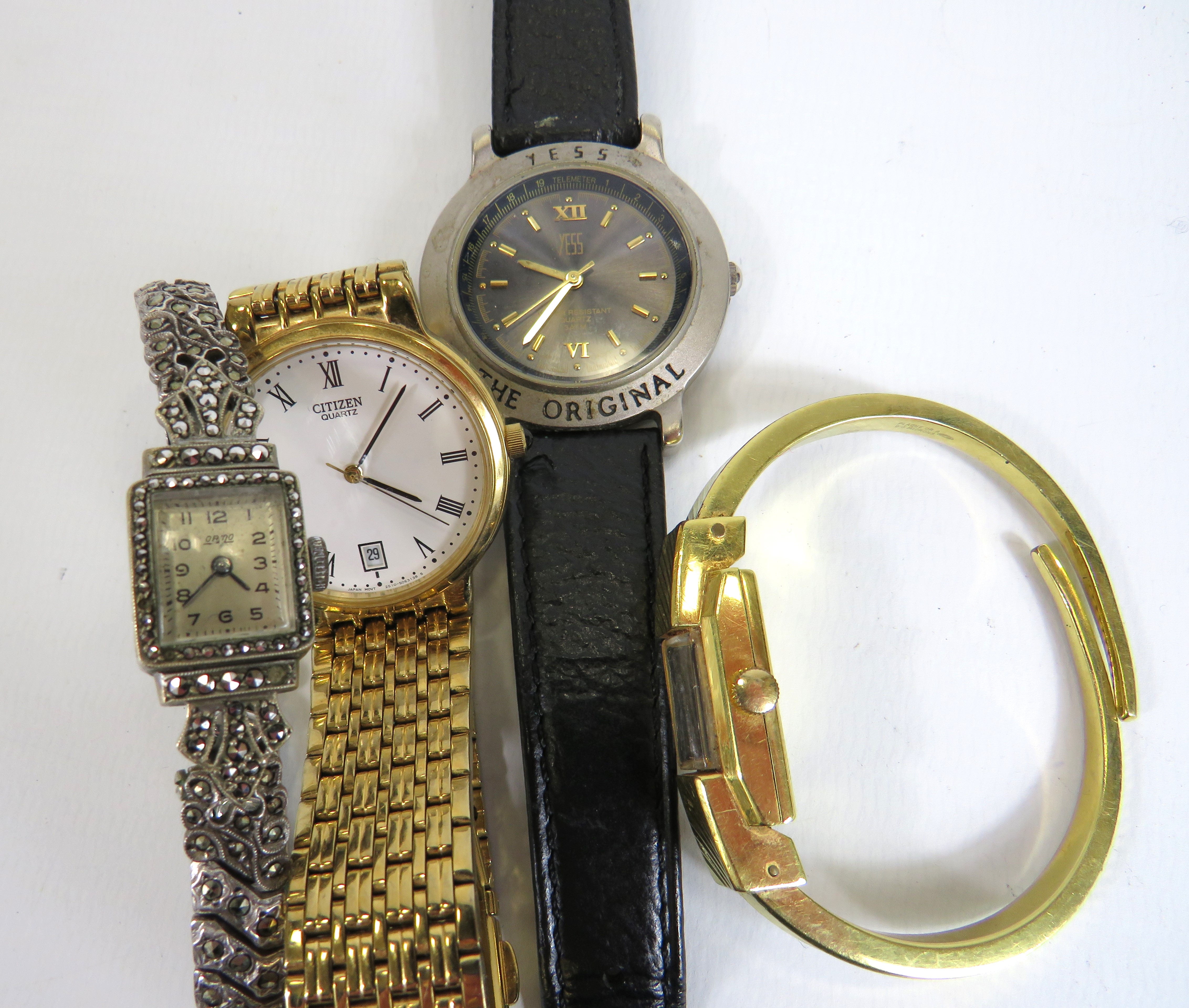 Two Mens & Two Ladies watches. One is a 925 Silver Marcasite mechanical.  See photos. 