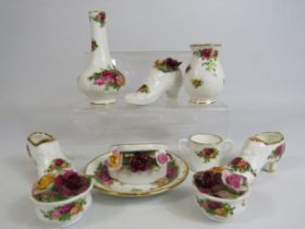 Selection of Royal Albert old country roses ornaments and posies.