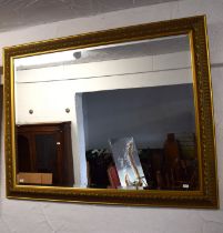 Large Bevelled glass mirror in fancy gilt frame. 36 x 44 inches. See photos. S2