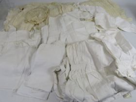 Selection of turn of the century childrens clothes including 3 dresses, top, vests, etc plus a 1940s