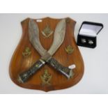 Nepalese Gurkha shield mounted with kukri knives and regimental badges plus a pair of Royal