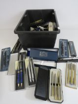 Large quantity of pens and pencils including boxed sets etc.